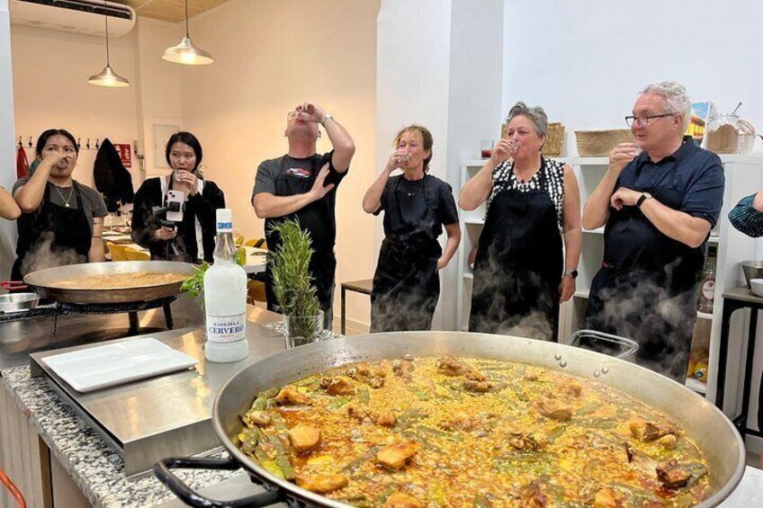 Paella cooking class - Local Market tour, Tapas & Wine 5