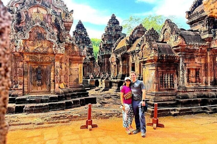 A temple complex with intricate carvings and multiple structures. 1