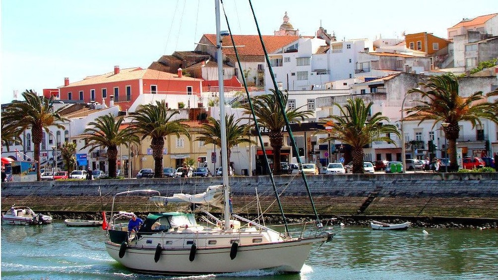 Sailboat in the water along the coast of Silves