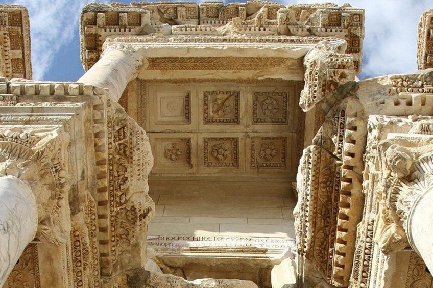 Intricate stone carvings and architectural details of an ancient structure. 5