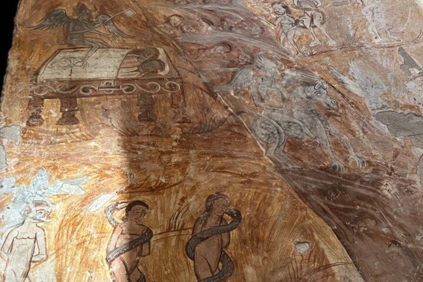 A detailed ancient fresco with mythological figures, including a centaur and a snake, on a wooden panel. 2