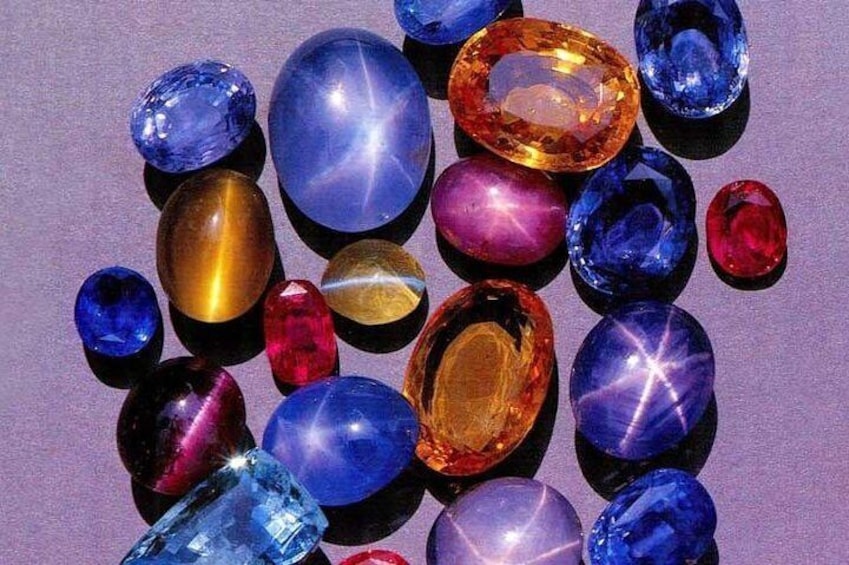 A collection of variously colored gemstones. 5