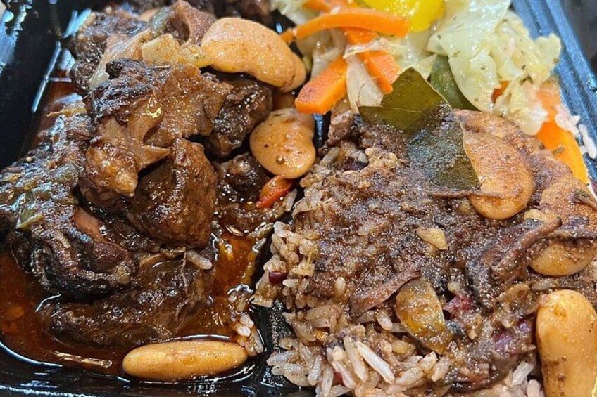 A meal with beef, rice, and vegetables. 5