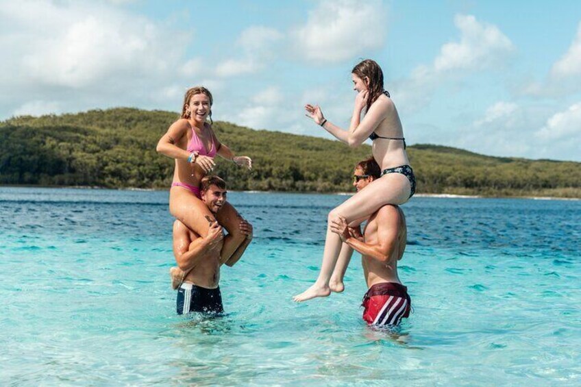 Swim in the crystal-clear waters of Boorangoora (Lake McKenzie)