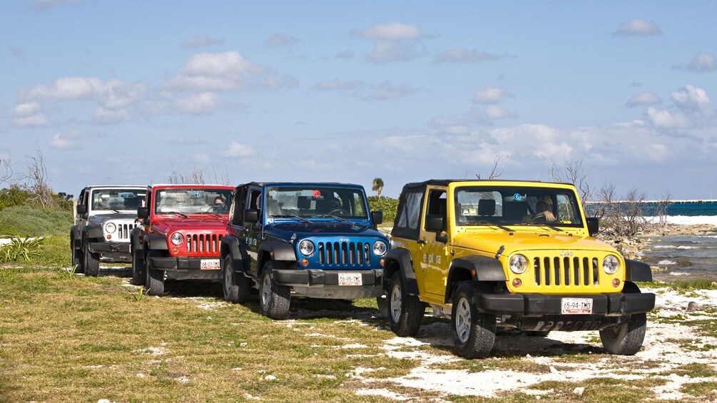 Jeeps driving along the coast in Riviera Maya