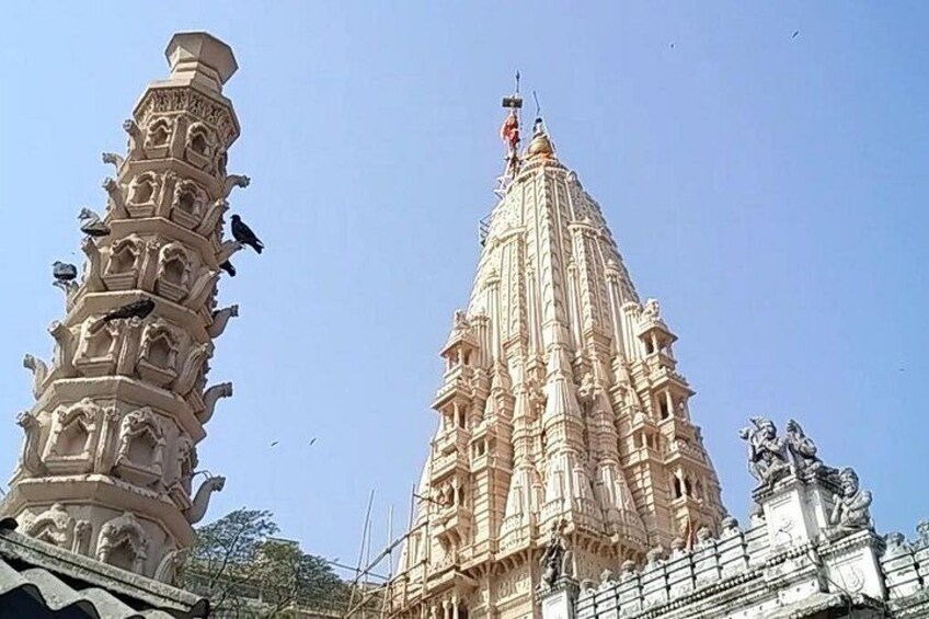 A temple with intricate carvings and a spire. 3