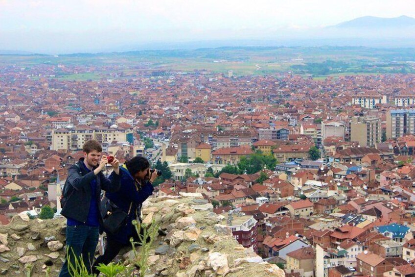 A cityscape with a view of a densely packed urban area from a high vantage point. 5