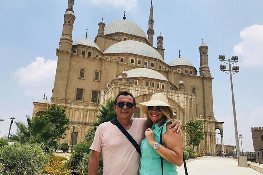 A historic building with domes and minarets. 4