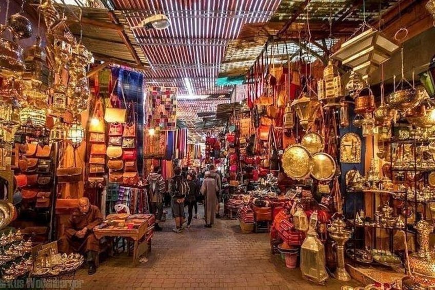 A bustling market with various stalls selling goods. 4