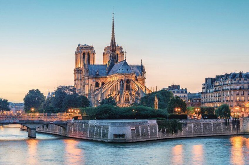 Notre-Dame Cathedral, a Gothic cathedral in Paris, with the Seine River in the foreground. 3