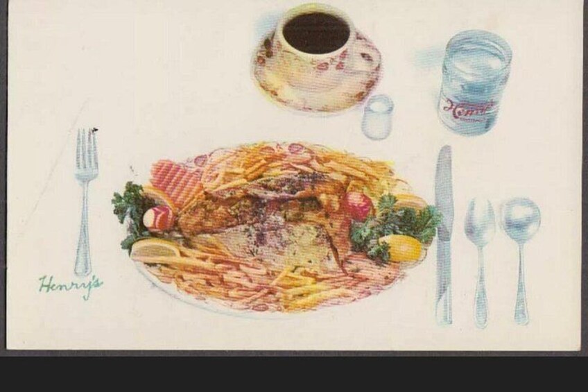 A plate of food with a fork, knife, and spoon, a glass of Coca-Cola, and a teacup. 3