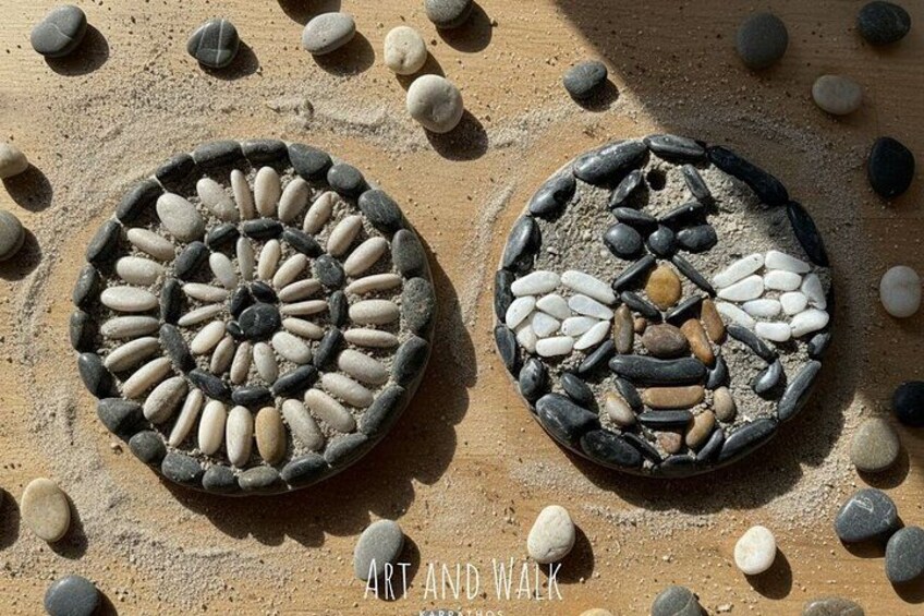 Two circular stone arrangements on sandy ground. 2