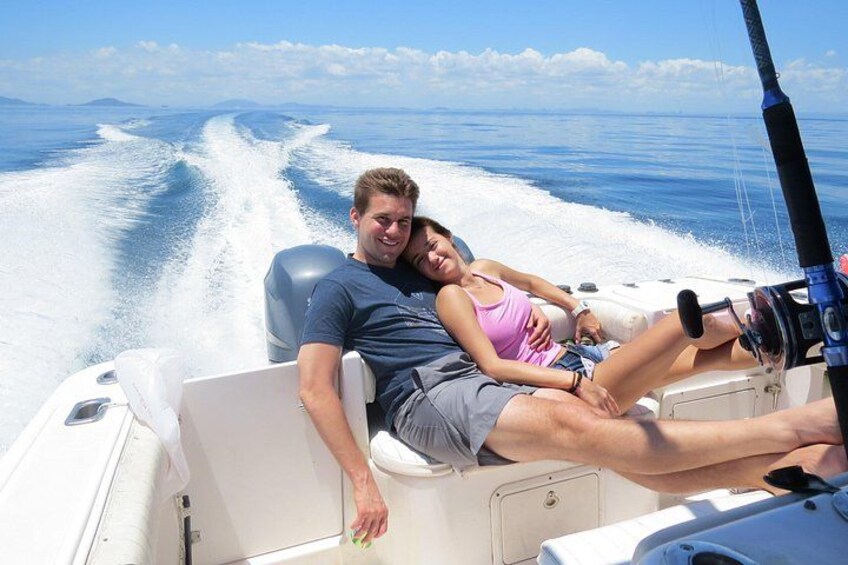 A person on a boat with a wake behind them, indicating movement through water. 5