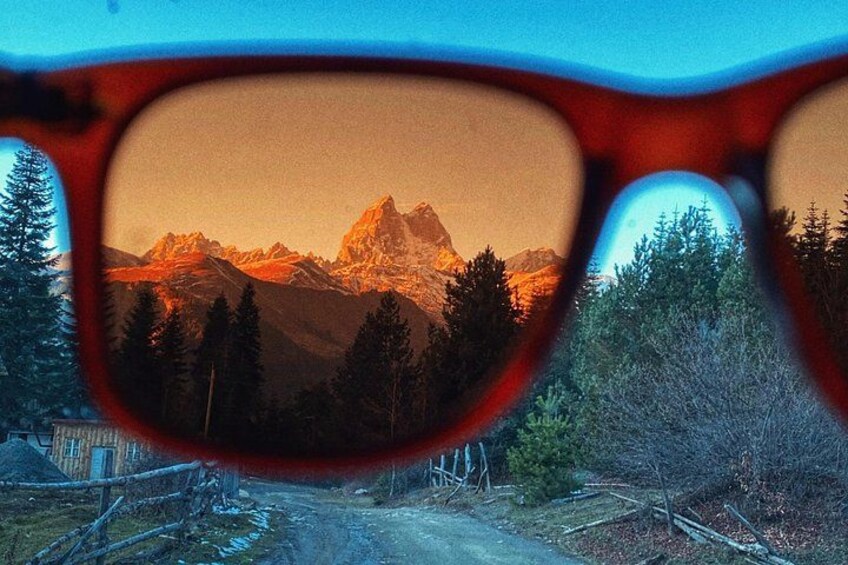 A mountain landscape through a pair of glasses. 5