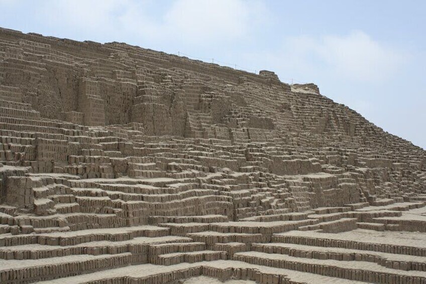 Terraced stone structures on a hillside. 5