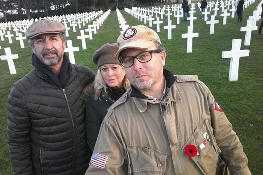 A cemetery with white crosses. 2
