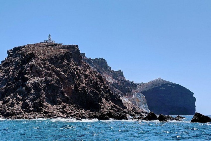 Pass by the lighthouse with the Indian Rock in the background. 2