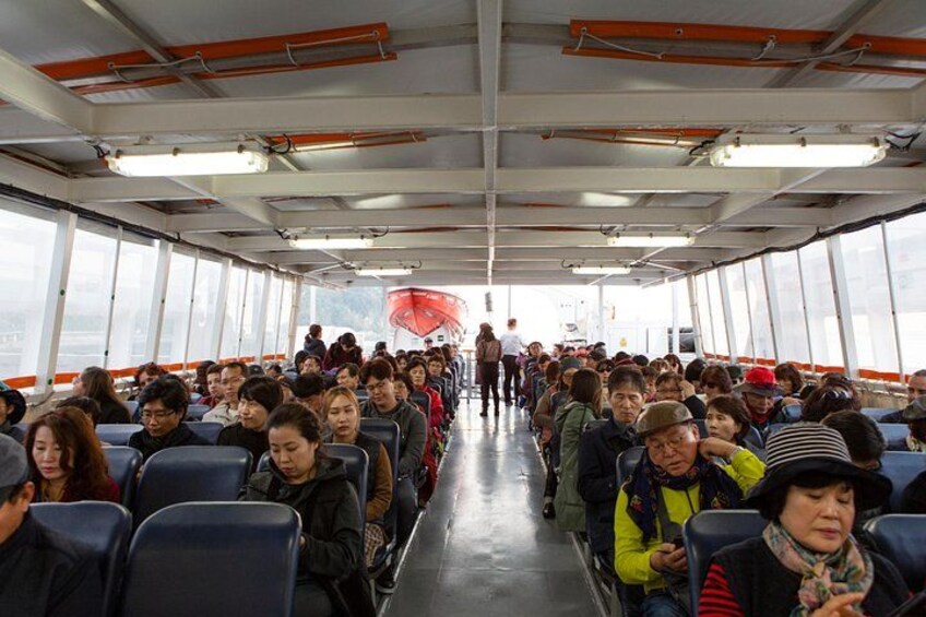 Visitors enjoying the peaceful ride back from Capri to Naples after a day of exploring the island. 4