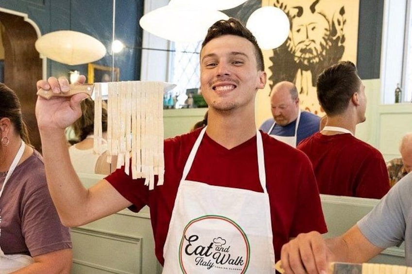 Happy guest with freshly made Fettuccine. 2