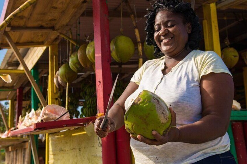 Meet Miss Mary - our favorite Coconut vendor.