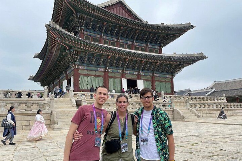 A traditional Korean building with a curved roof and multiple levels. 5