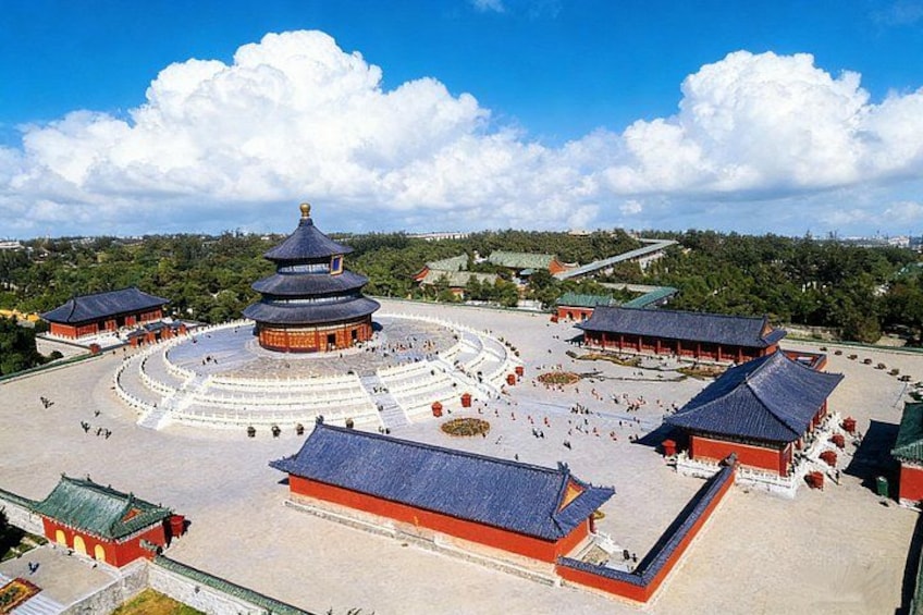 A traditional Chinese architectural complex with a large pagoda, multiple buildings, and a spacious courtyard. 3
