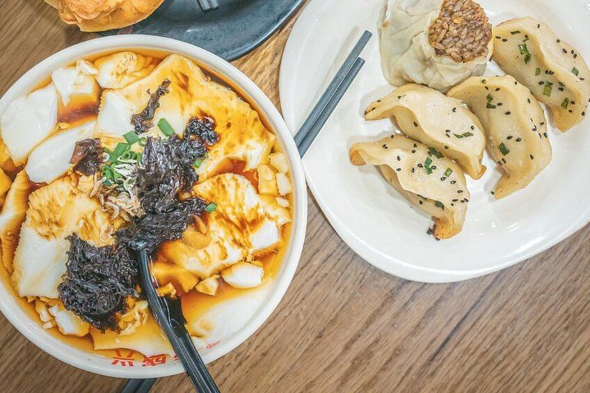 Don't miss our signature tofu pudding, a local favorite. This delightful dish has earned its reputation, making our spot a go-to for those in the know. 5