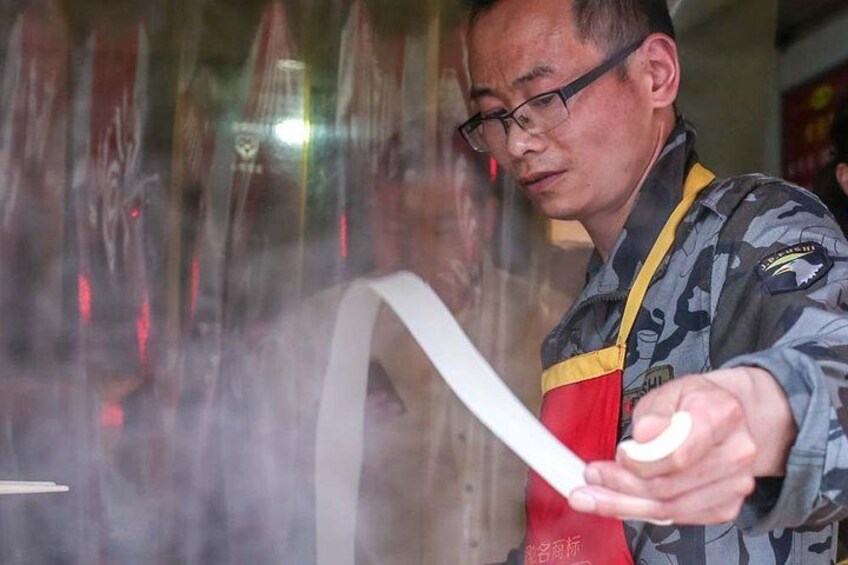 Xian's famous Biang Biang noodles made fresh to order. 4