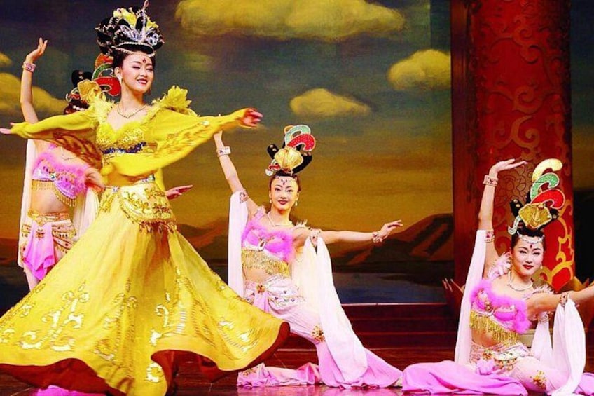 A performance with dancers in traditional costumes. 3