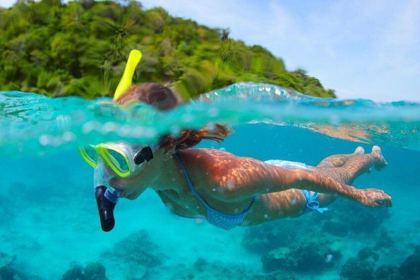 Snorkeling in crystal clear in Sapi Island 1