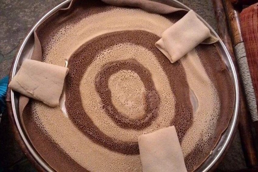 Enjera - the Ethiopian National bread made of brown and lighter colored seeds known as "Teff" 4