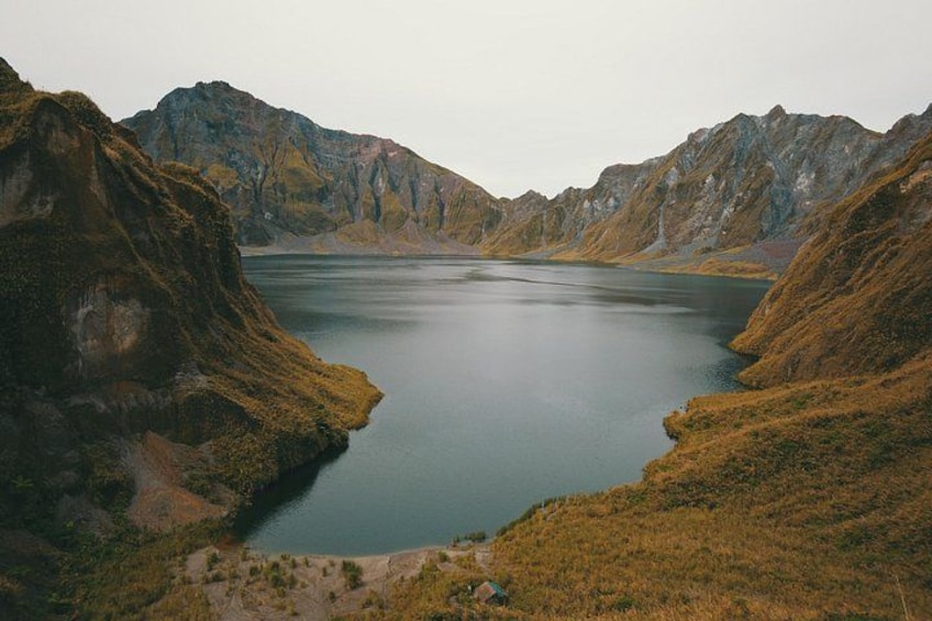 A lake surrounded by mountains. 2
