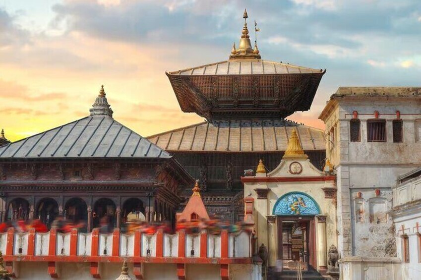 A traditional building with a large pagoda-style roof and a clock tower. 3