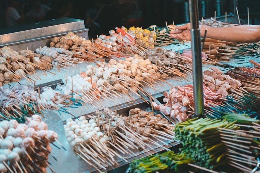 A variety of skewers with different meats and vegetables. 4