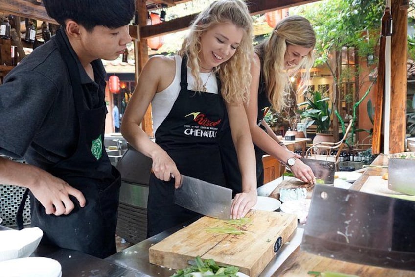 Cooking in traditional courtyard 1
