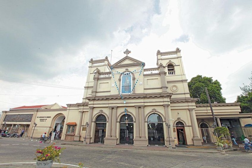 A historic church with a central dome and arched windows. 2