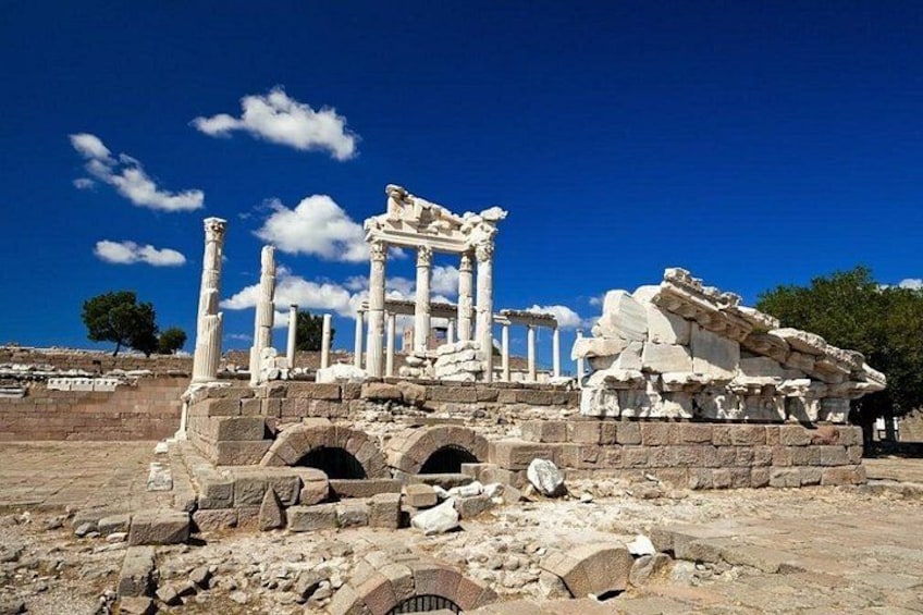 Ancient ruins with columns and stone structures. 5