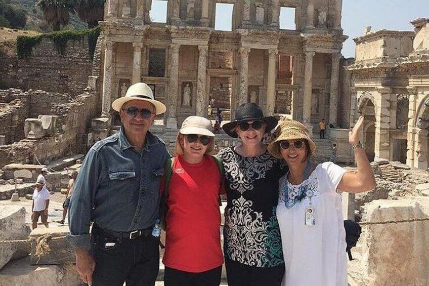 A historical site with ancient ruins, including columns and arches. 3