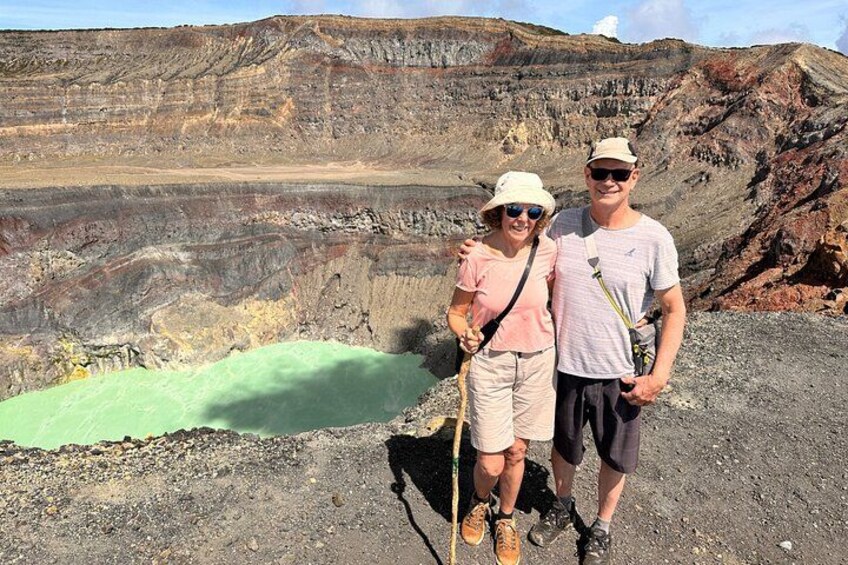 A Canadian couple is posing in front of the santa ana volcano 5