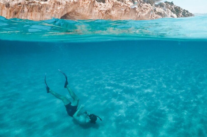 Dive into crystal-clear waters and enjoy a refreshing break in a stunning, serene location. 2