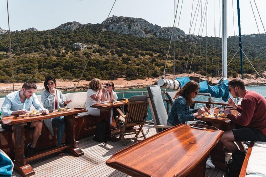 Lunch on Board: Savor a delightful experience on the sea, with freshly prepared dishes served in a stunning setting 3