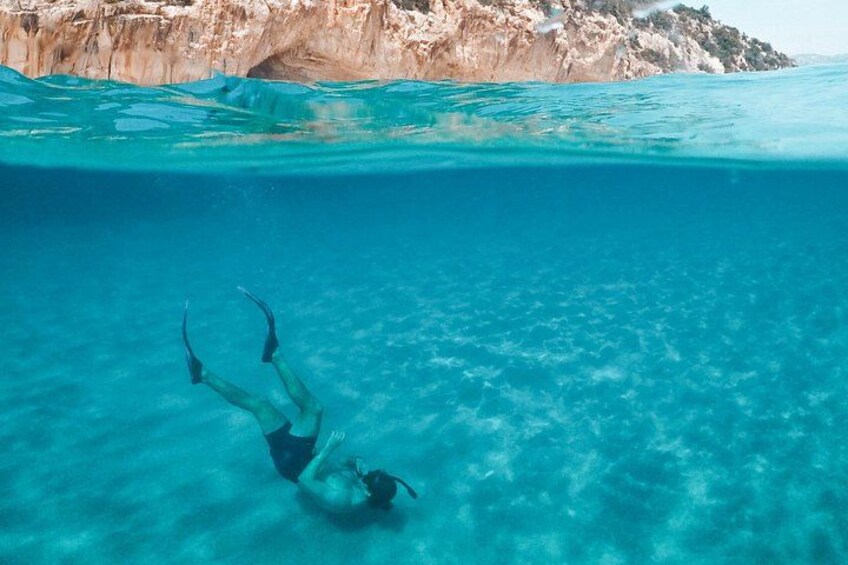 Dive into crystal-clear waters and enjoy a refreshing break in a stunning, serene location. 2