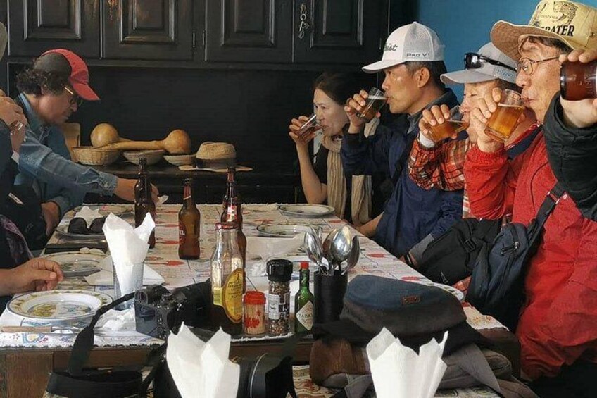 It is a highly involving tour, giving you the chance to walk the streets, hear the children at play, smell the sidewalk barbecues, taste locally brewed beer and try some of the local food like the mop 4