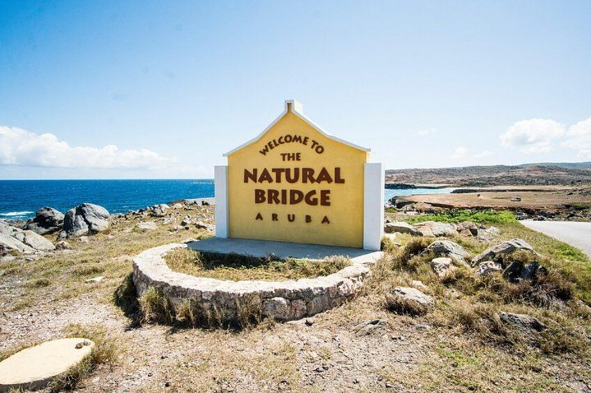 A welcome sign for the Natural Bridge in Aruba. 1