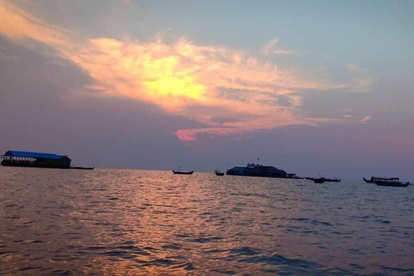 The sun is nearly set down in the water 2