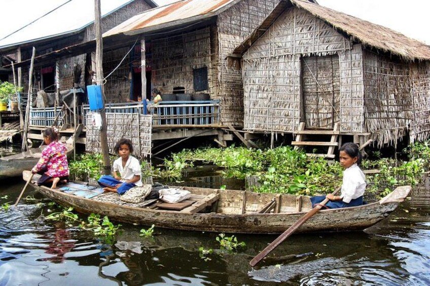The kids are going to school with their small boat 1