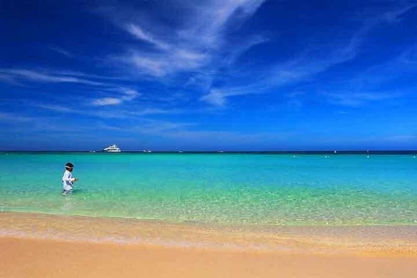 Discover West Bay Beach, crystalline clear and warm waters 4