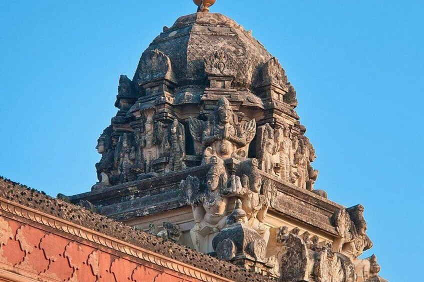 A temple with intricate carvings and a large dome. 5