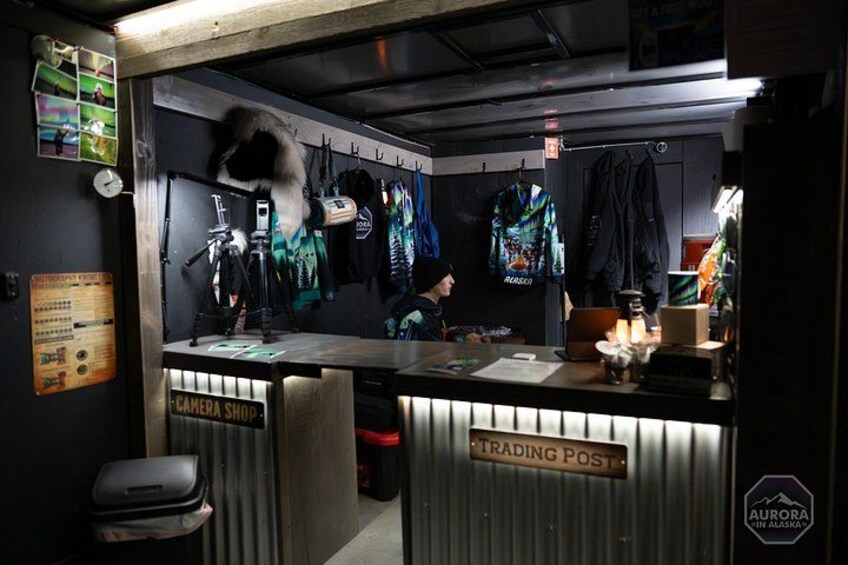 Enjoy warming up inside our Mobile Aurora Lodge while shopping at the Trading Post or visiting the Camera Shop 5