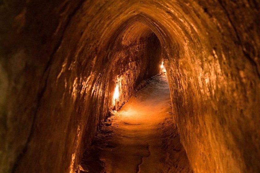 A tunnel with a narrow, illuminated path. 2